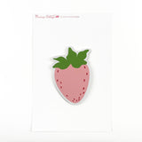 a strawberry-shaped spring paper place card designed by Madcap Cottage  on a white background