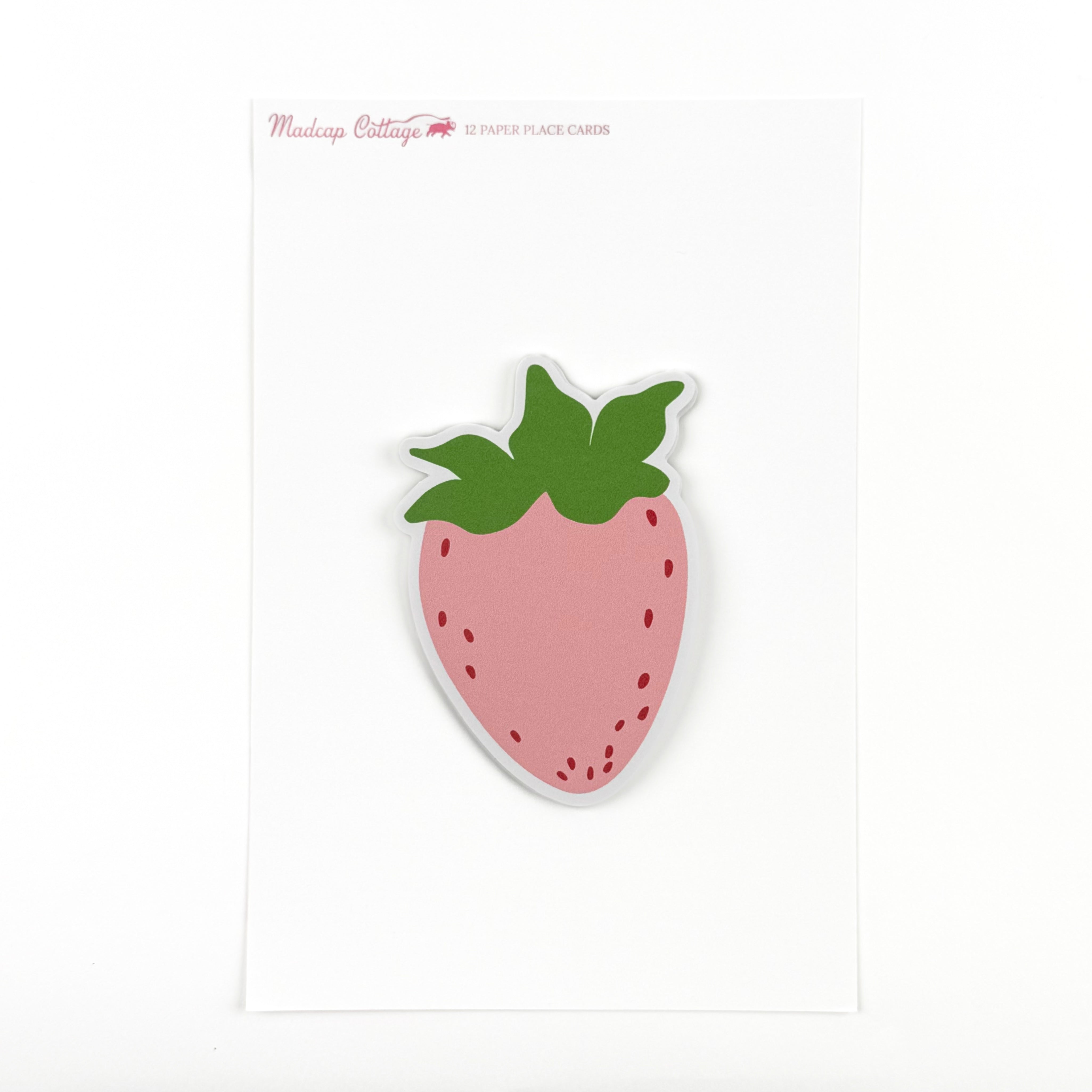 a strawberry-shaped spring paper place card designed by Madcap Cottage  on a white background