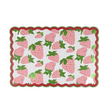 A rectangular pink strawberry paper placemat with a green and red boarders on a white background
