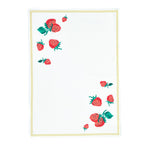 a white strawberry tea towel with a strawberries in the corner and a yellow border around the edges resting on a white background. 