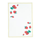 a white strawberry tea towel with a strawberries in the corner and a yellow border around the edges resting on a white background. 