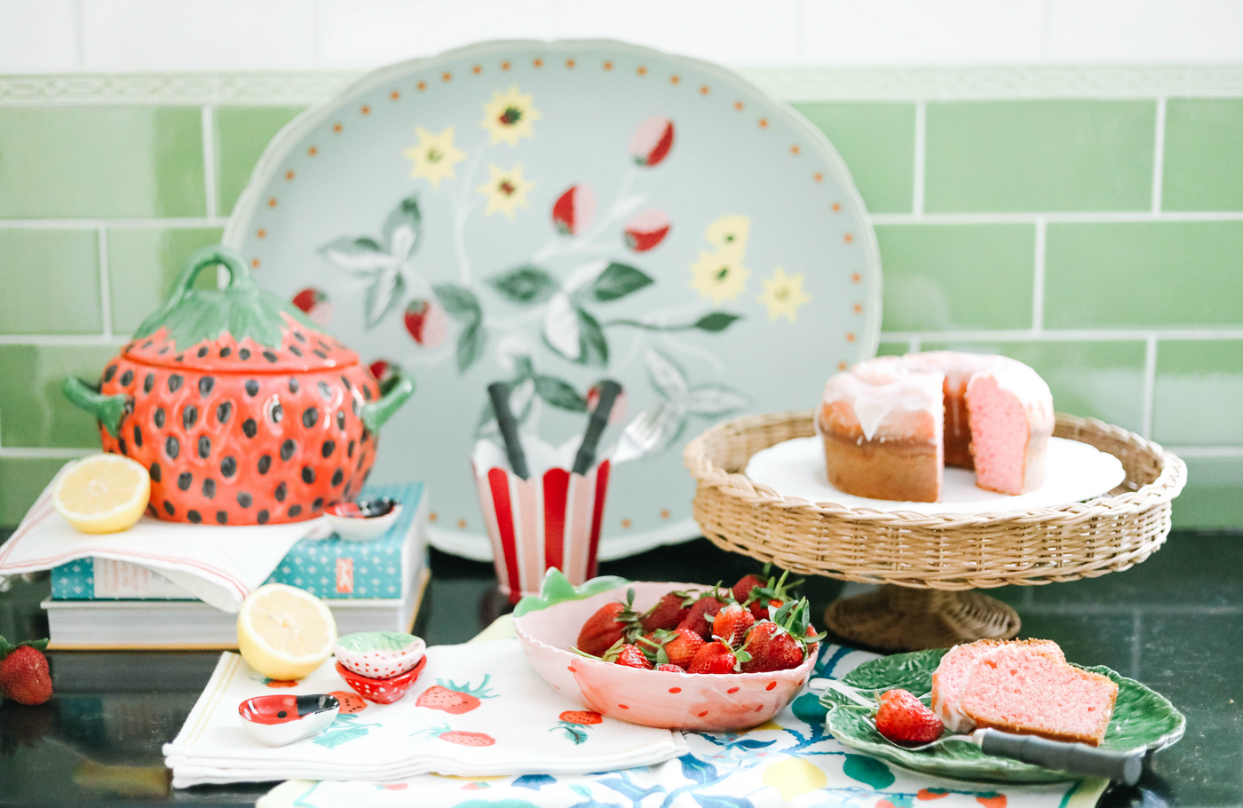 a kitchen scene filled with strawberry decor