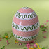 a striped pink large decorative easter egg in tole metal