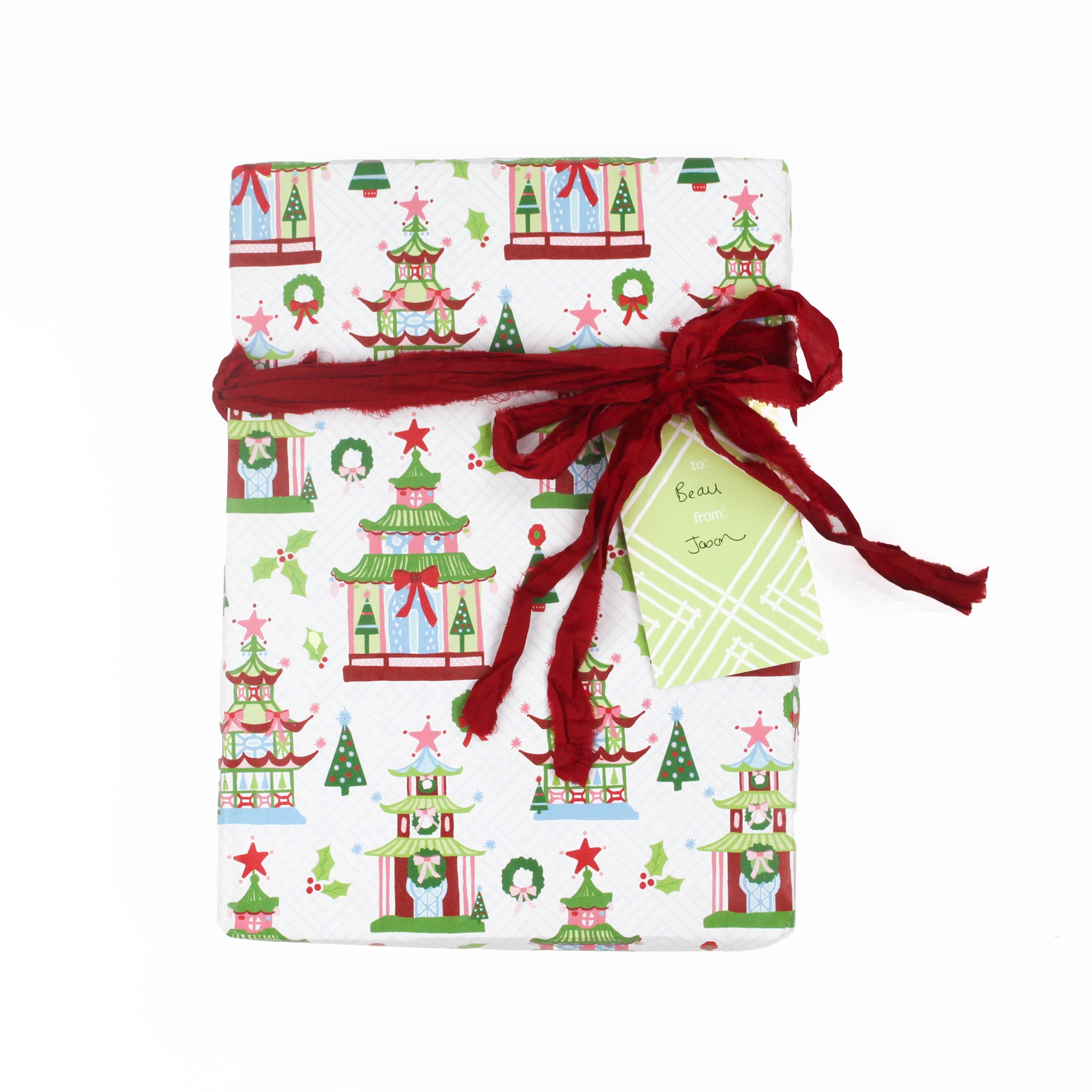 a gift tag with a geometric lattice pattern in green/yellow, added to a wrapped present
