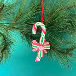 colorful candy-themed Christmas ornaments shaped like candy canes