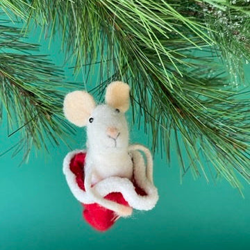 one felt mouse ornament sitting inside a red Christmas stocking with white trim.