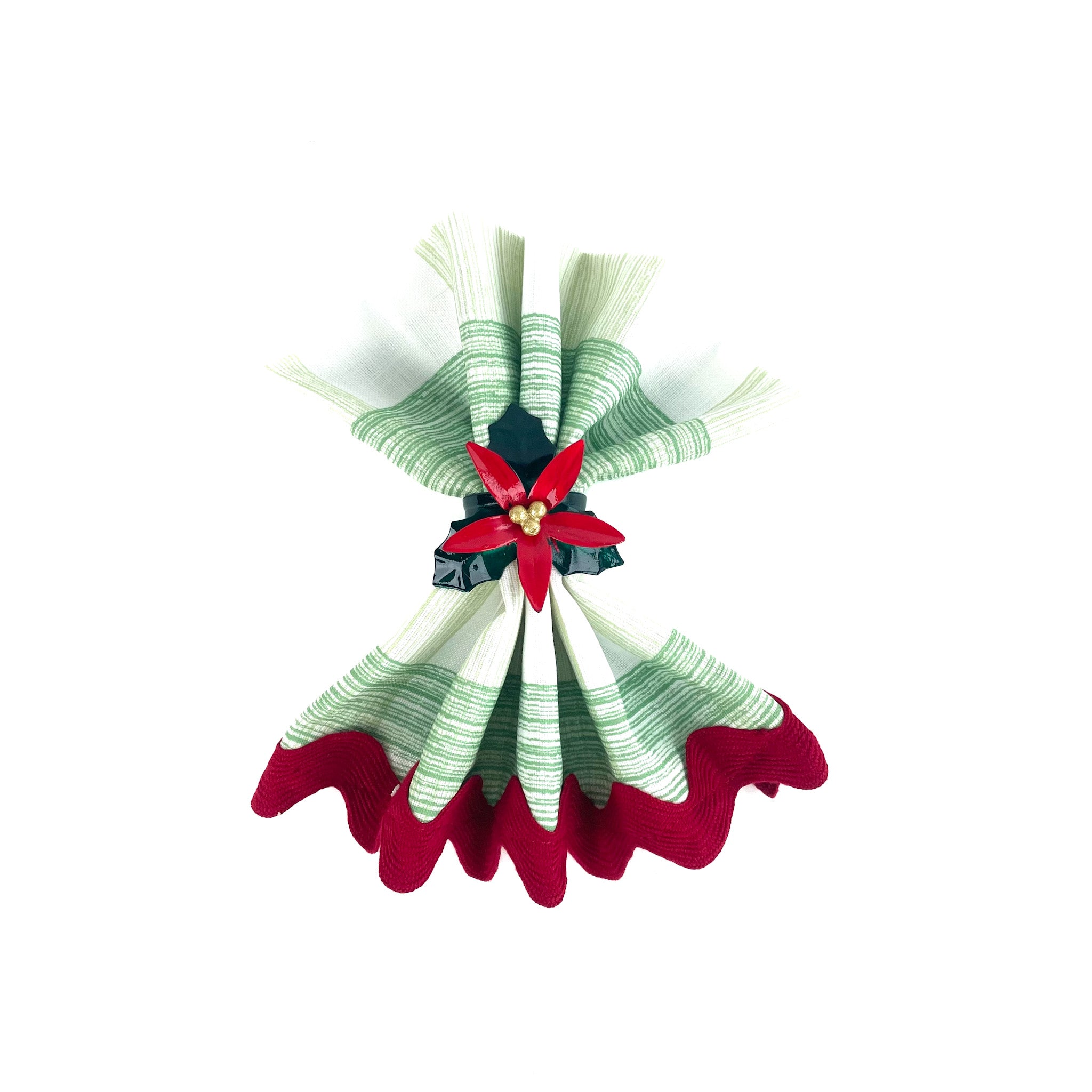 Hand-painted poinsettia napkin ring holding a folded green and red napkin on a white background.