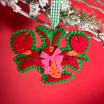 Handcrafted Lobster Felt Christmas Ornament on a red background