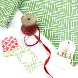 a wrapping paper with a geometric lattice pattern in green