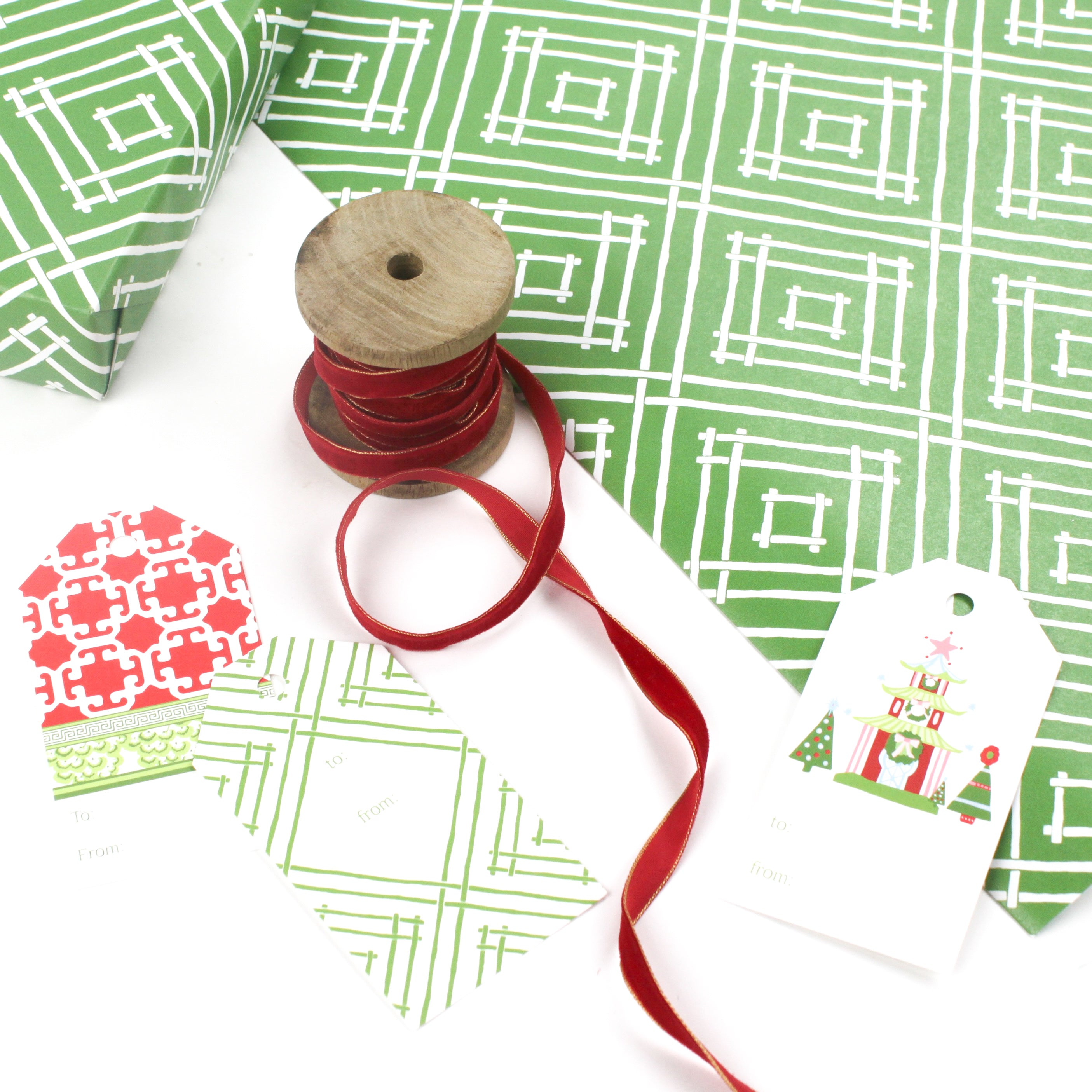 a wrapping paper with a geometric lattice pattern in green