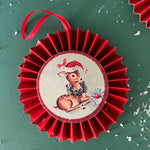 retro-style ruffled paper Christmas ornaments featuring vintage illustration, accented with red pleated borders and hanging ribbons