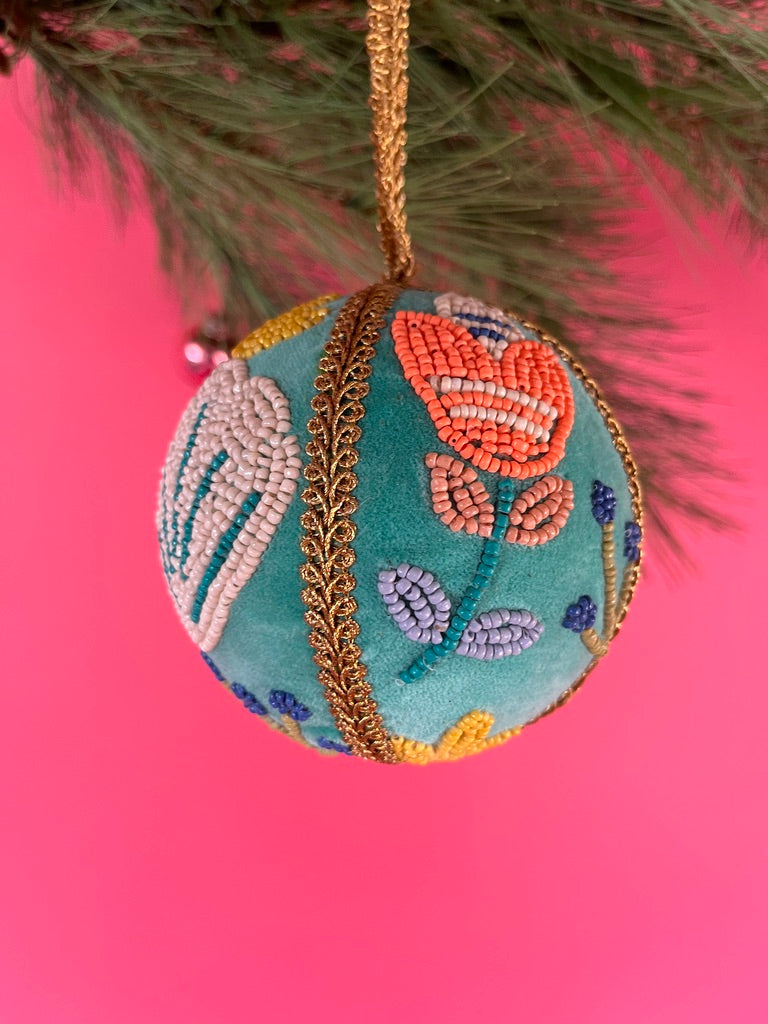 velvet Christmas ball ornaments beautifully hand-embroidered with beaded floral designs and finished with gold braided trim and hanging loops