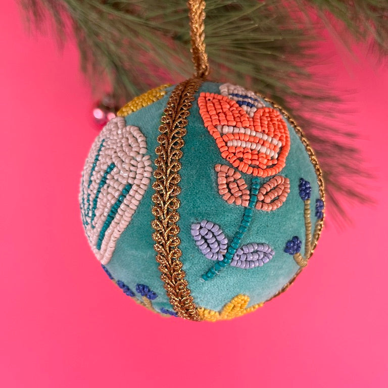 velvet Christmas ball ornaments beautifully hand-embroidered with beaded floral designs and finished with gold braided trim and hanging loops