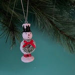 vintage-style snowman ornaments, wearing a colorful top hat and scarf