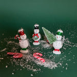 vintage-style snowman ornaments, wearing a colorful top hat and scarf