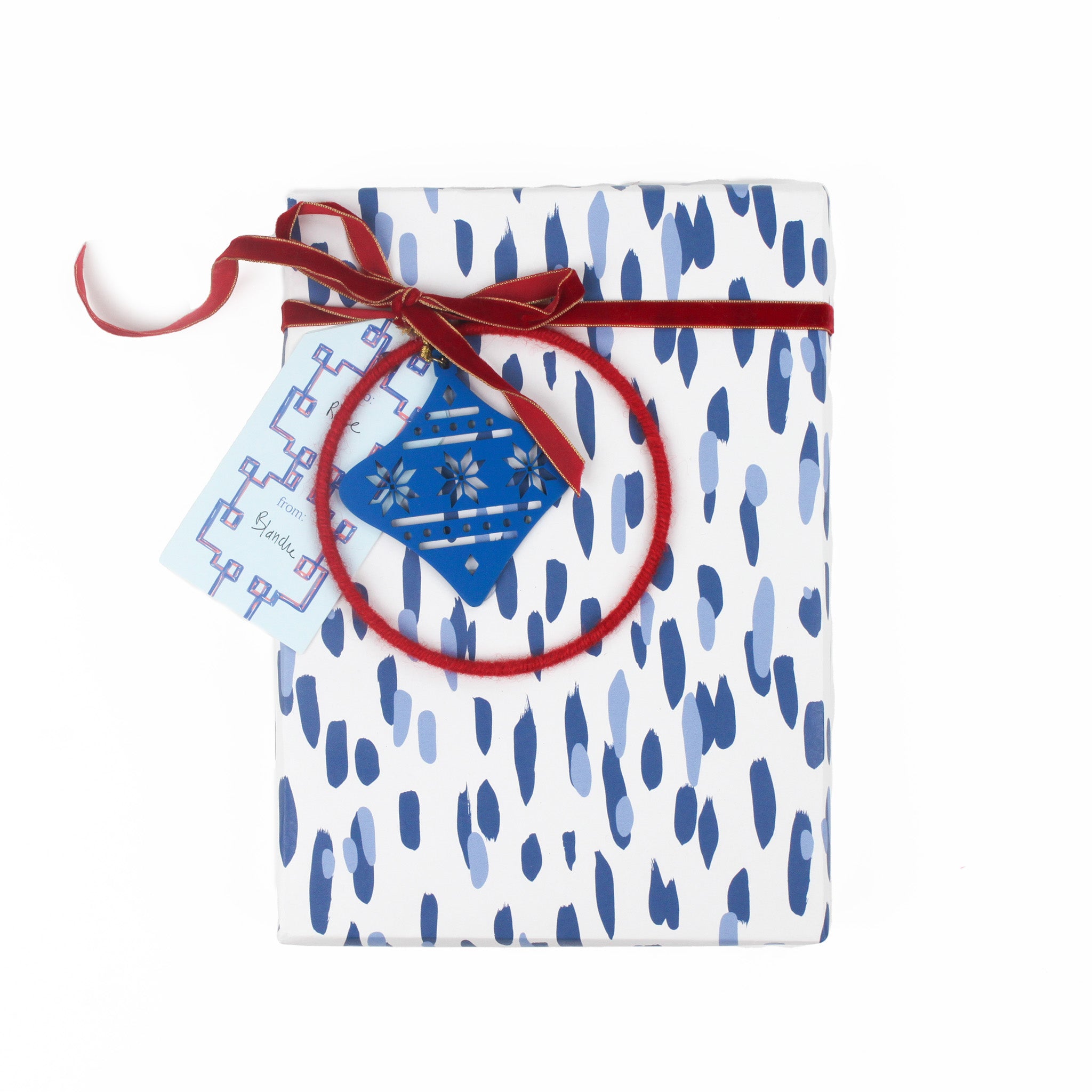 a gift tag with bamboozled pattern in blue with a space for personal message attached on a wrapped present