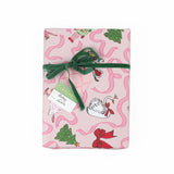 madcap cottage pink and green fez gift tags detail attached to a wrapped present