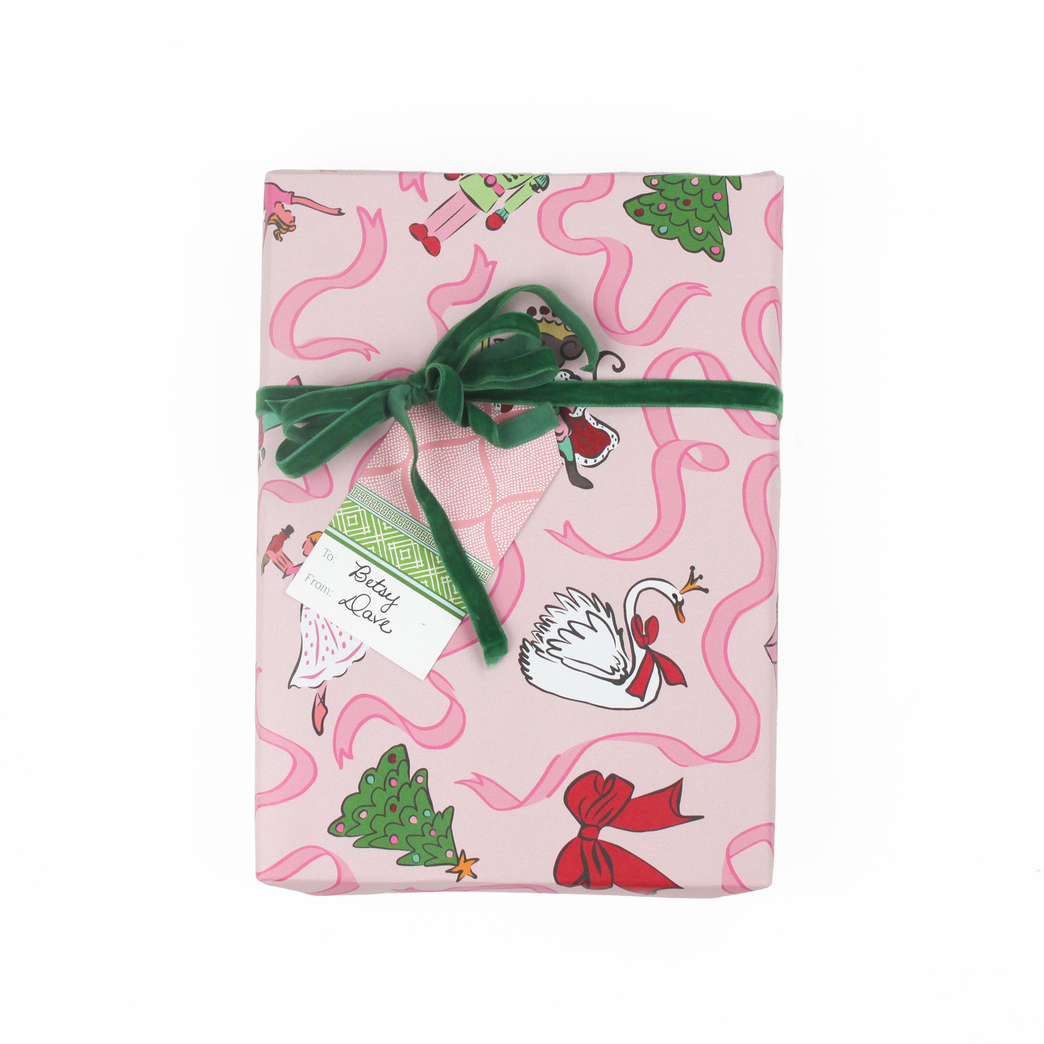 madcap cottage pink and green fez gift tags detail attached to a wrapped present