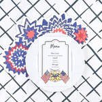 Menu card with patriotic design on a white plate against a checkered background