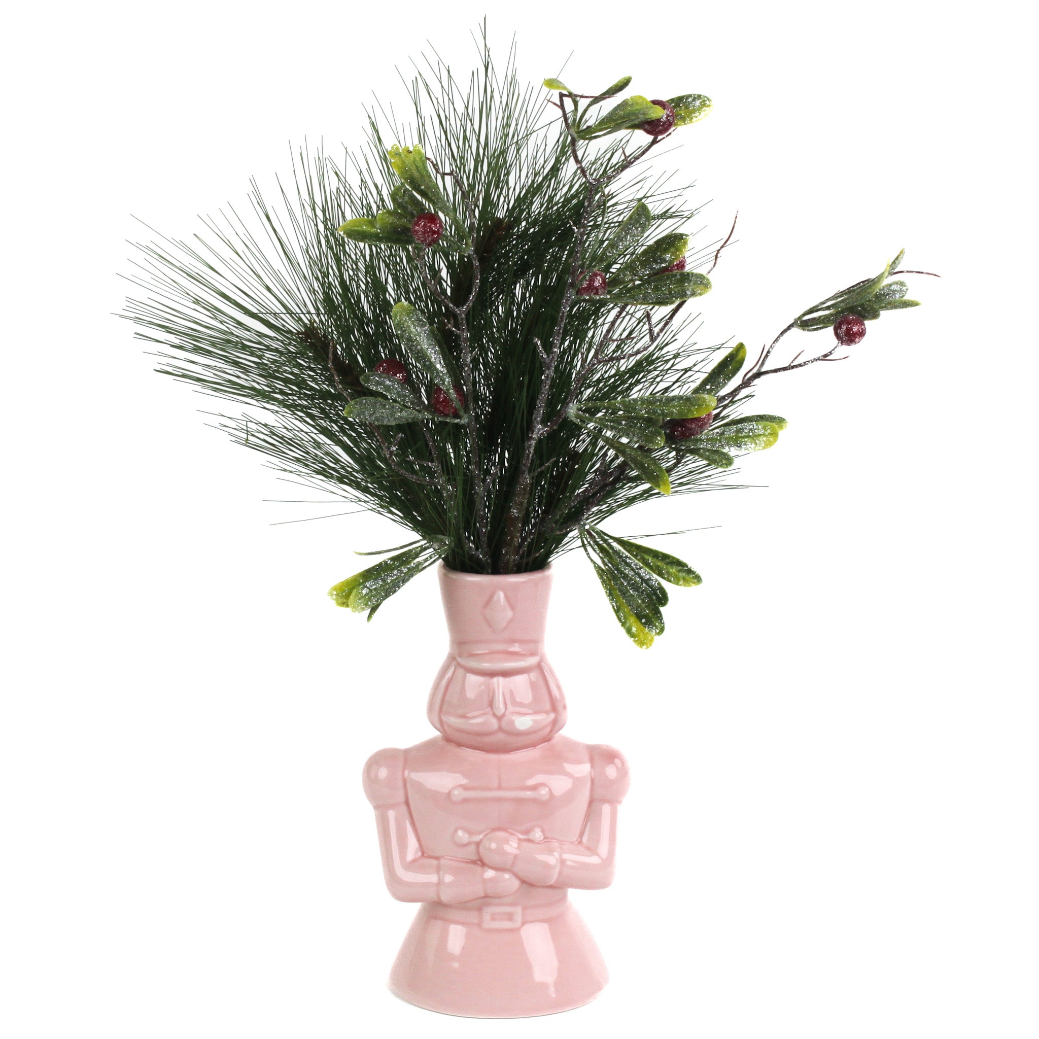 Pink nutcracker vase filled with greenery on a white background