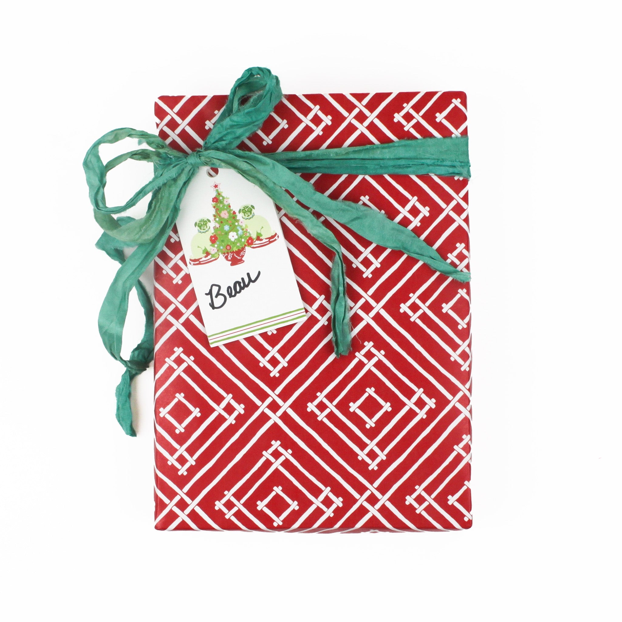 gift tags with christmas tree and pugs design with white space for personalized message attached to a wrapped present
