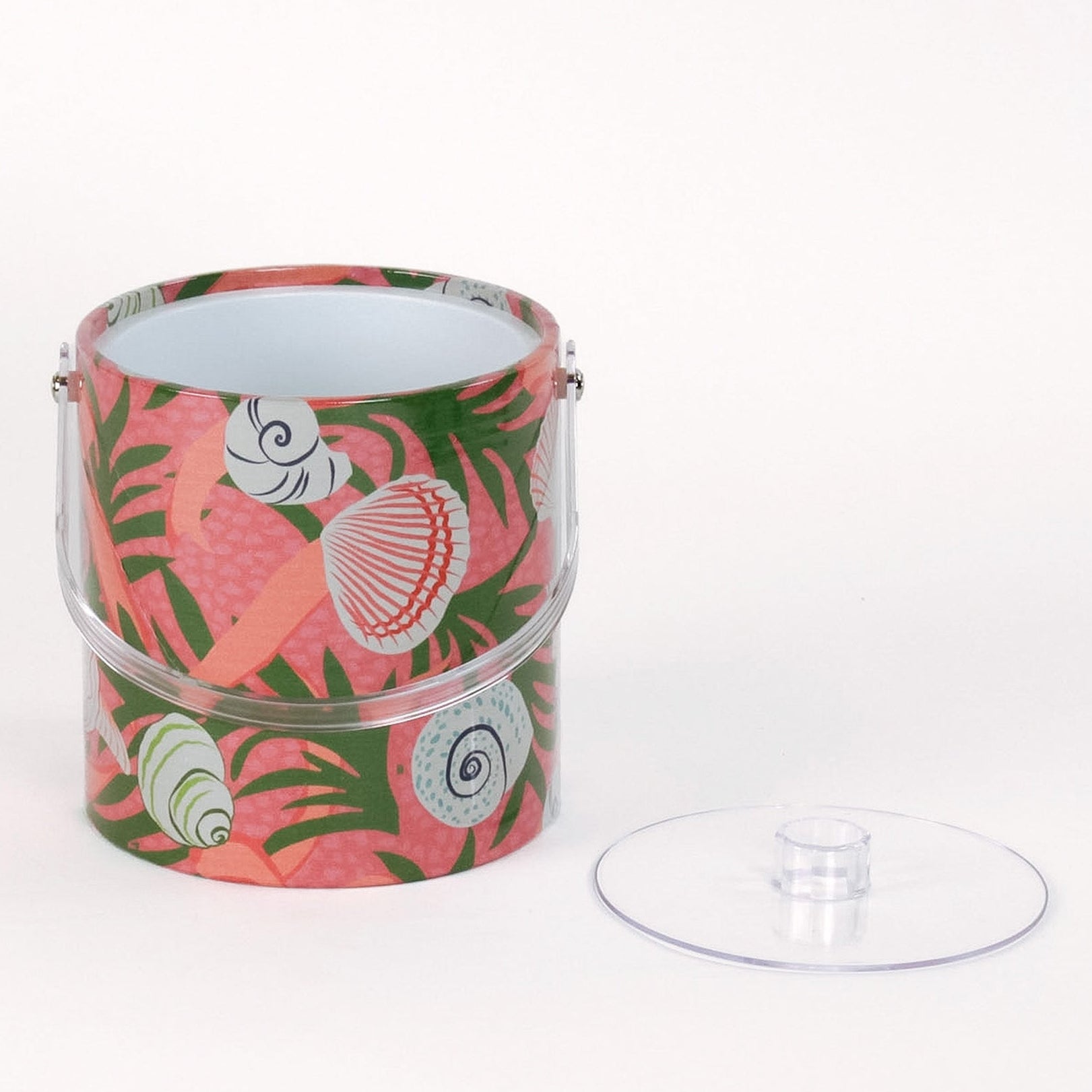 Shell Seekers, a pink acrylic ice bucket from madcap cottage covered in shell and seaweed motifs