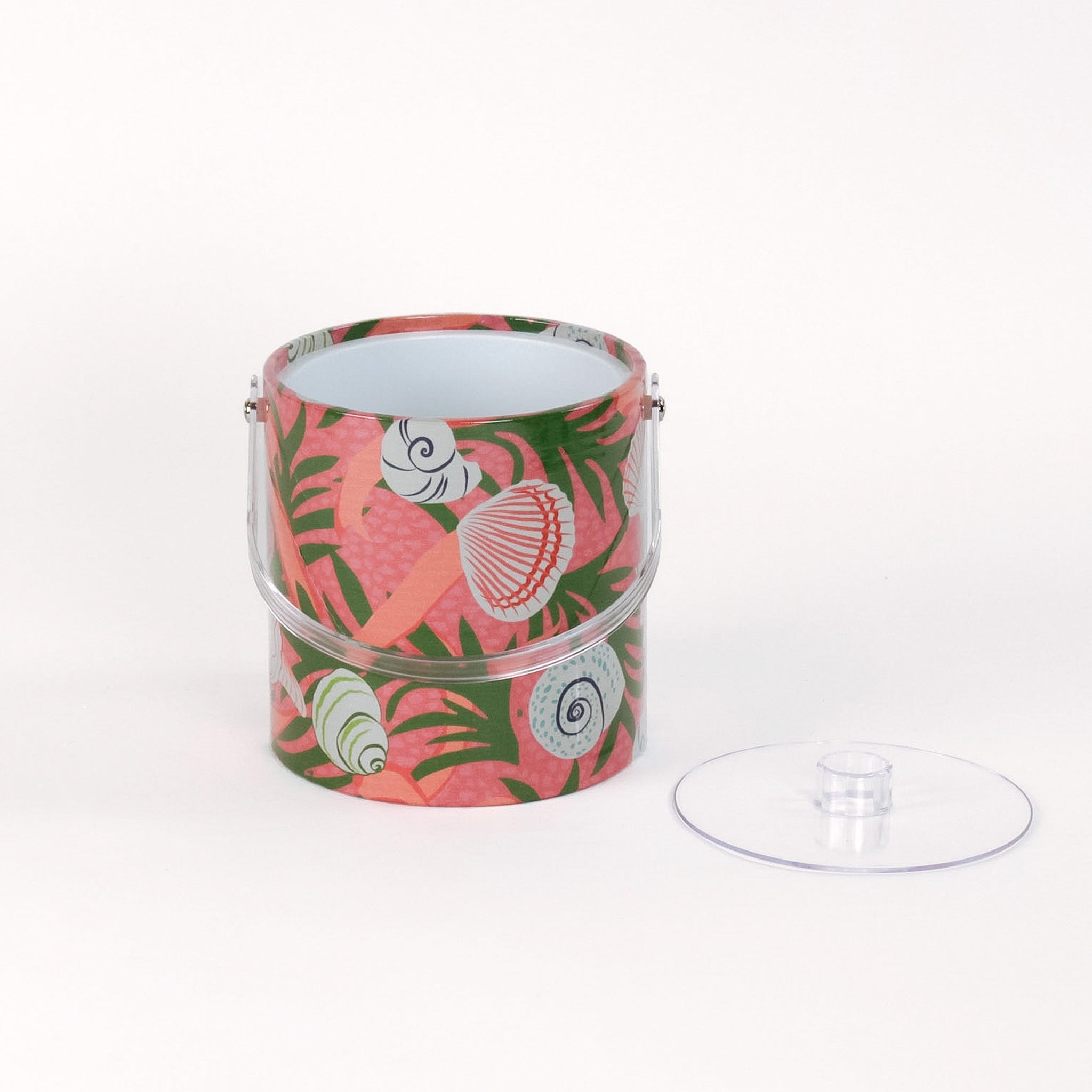 Shell Seekers, a pink acrylic ice bucket from madcap cottage covered in shell and seaweed motifs