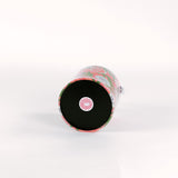 Bottom view of Shell Seekers acrylic ice bucket with lid on the side
