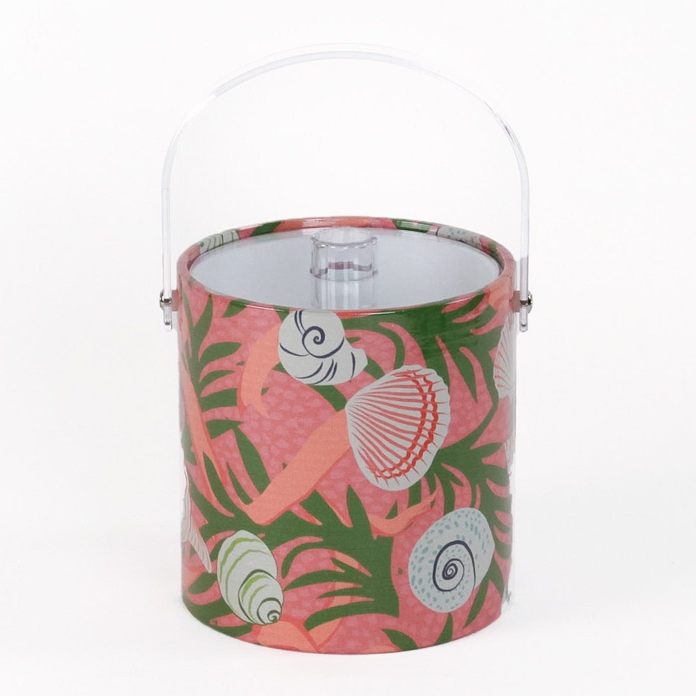 Shell Seekers is a pink acrylic ice bucket from madcap cottage covered in shell and seaweed motifs featuring a clear handle and lid