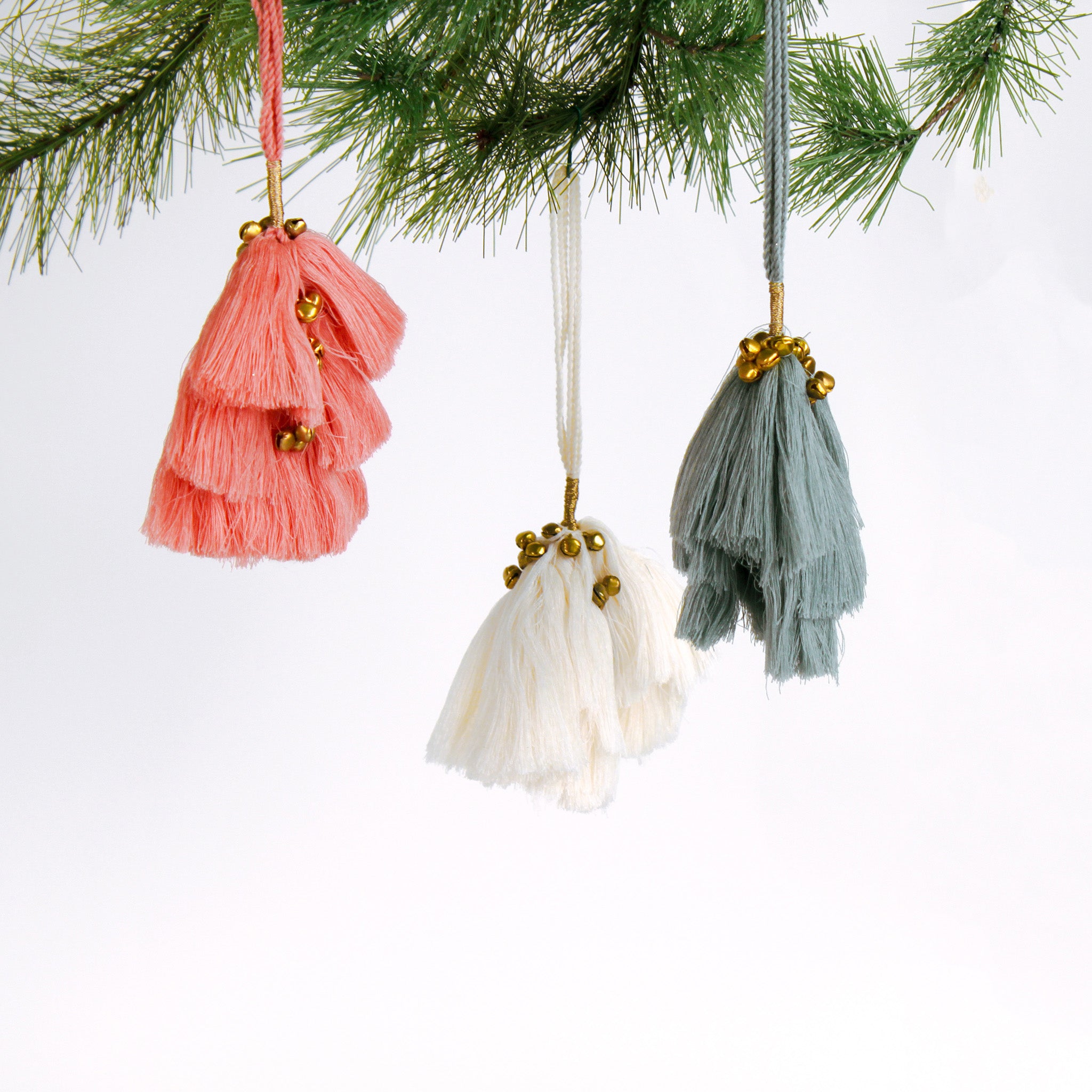 Set of three elegant tassel Christmas ornaments with small gold bells