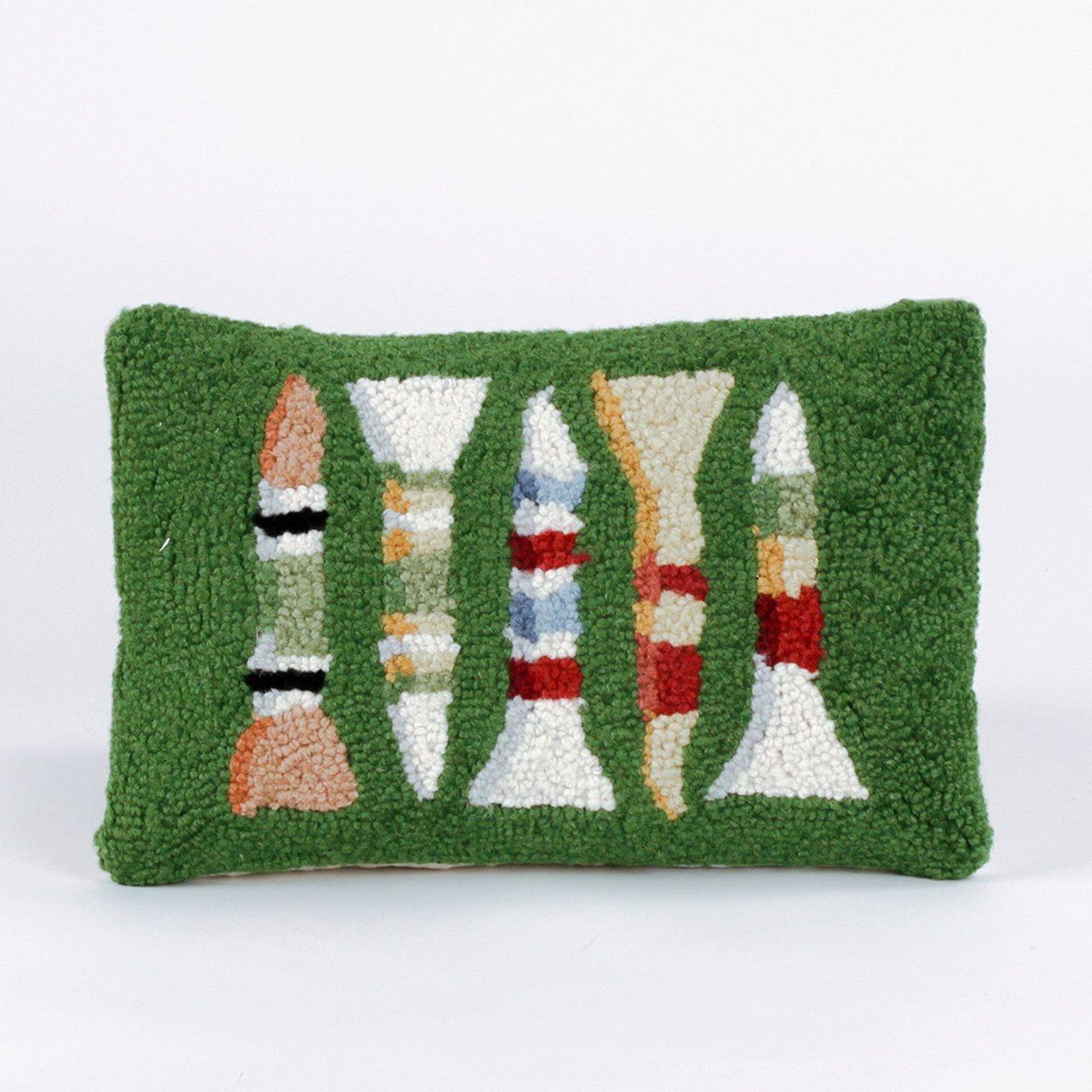 Rectangular green decorative pillow with a hooked texture, featuring a colorful pattern of golf tees in white, red, blue, yellow, and peach tones.