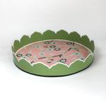 Temple Garden, a tole metal tray with scalloped edges in green with a pink and green chinoiserie peony blossom pattern