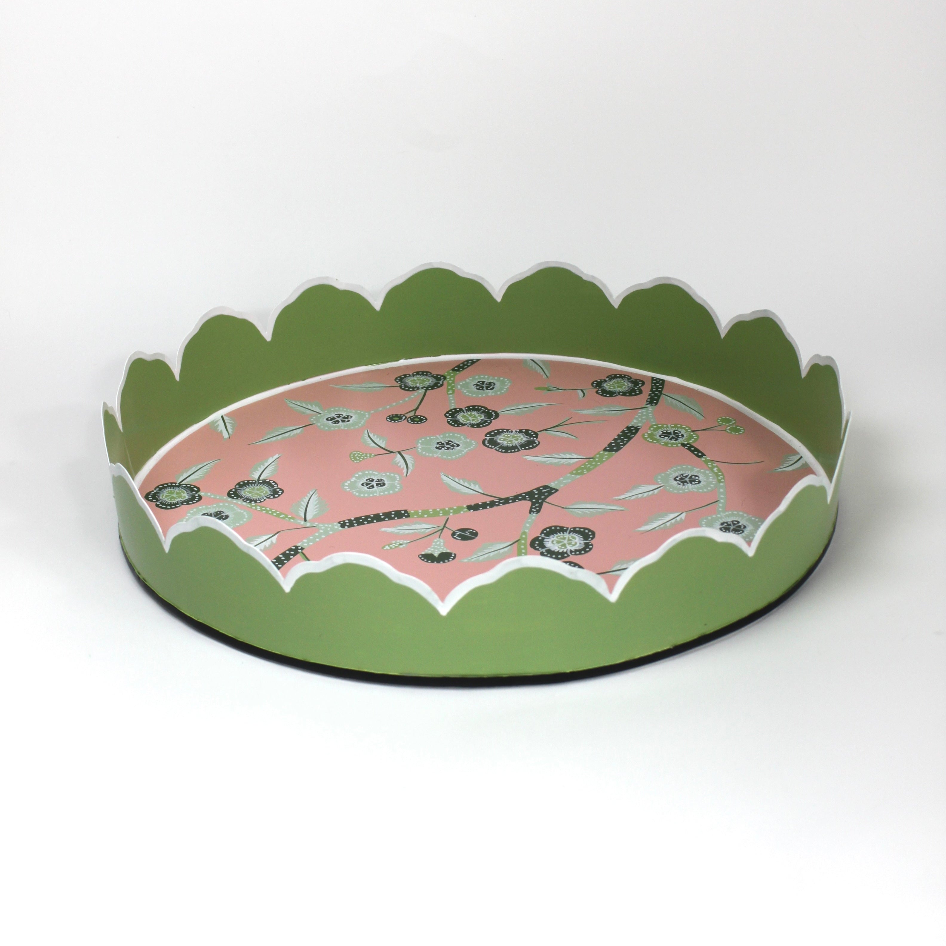 Temple Garden, a tole metal tray with scalloped edges in green with a pink and green chinoiserie peony blossom pattern