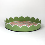 Temple Garden, a tole metal tray with scalloped edges in green with a pink and green chinoiserie peony blossom pattern