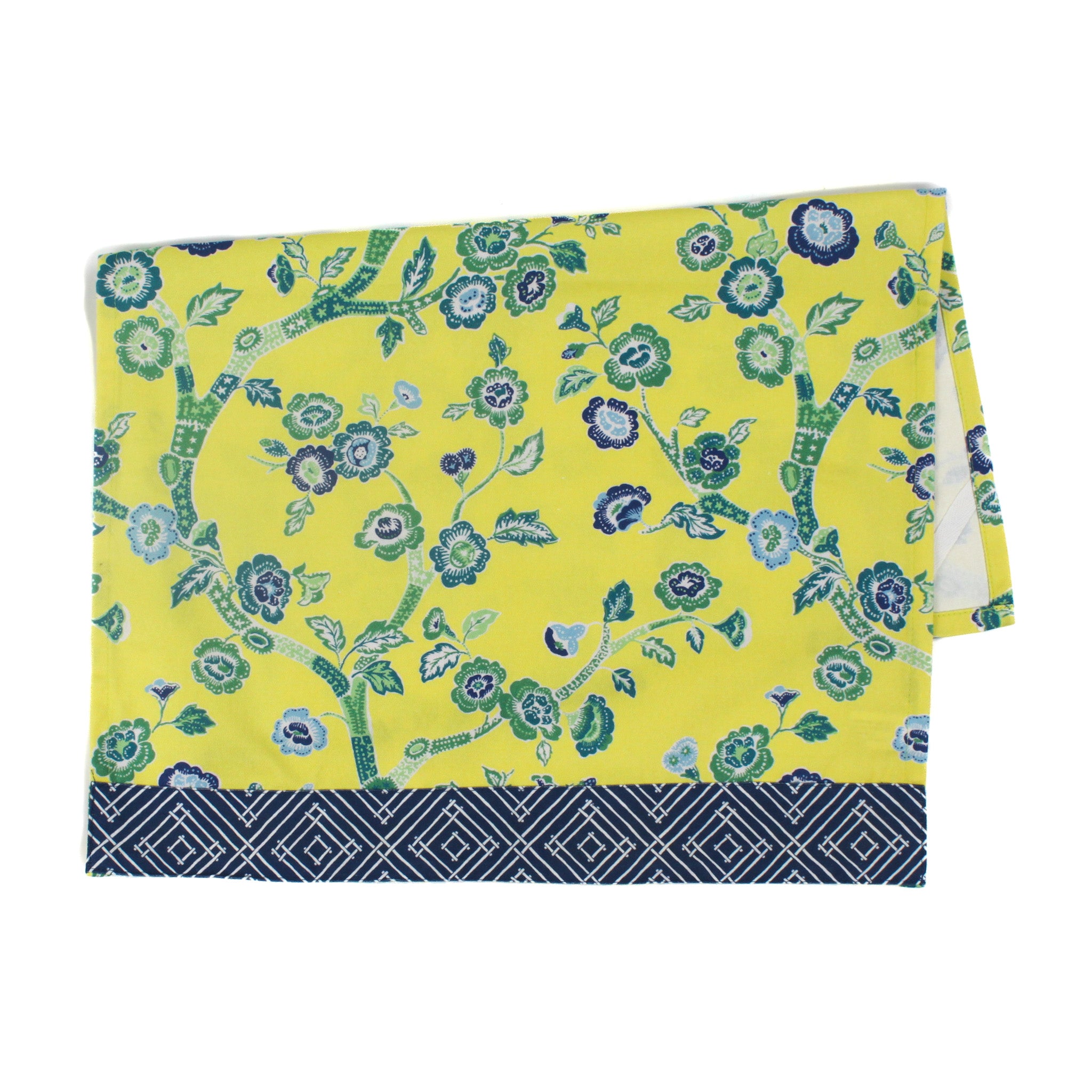 A yellow chinoiserie tea towel with a blue cherry blossom motif and a blue lattice pattern border against a white background. 