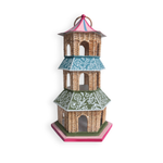 A decorative miniature pagoda with three tiers, featuring a natural rattan body, teal and green patterned roofs, and pink accents on the top and base, shown against a plain white background.