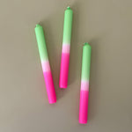 three pink and green spring taper candles