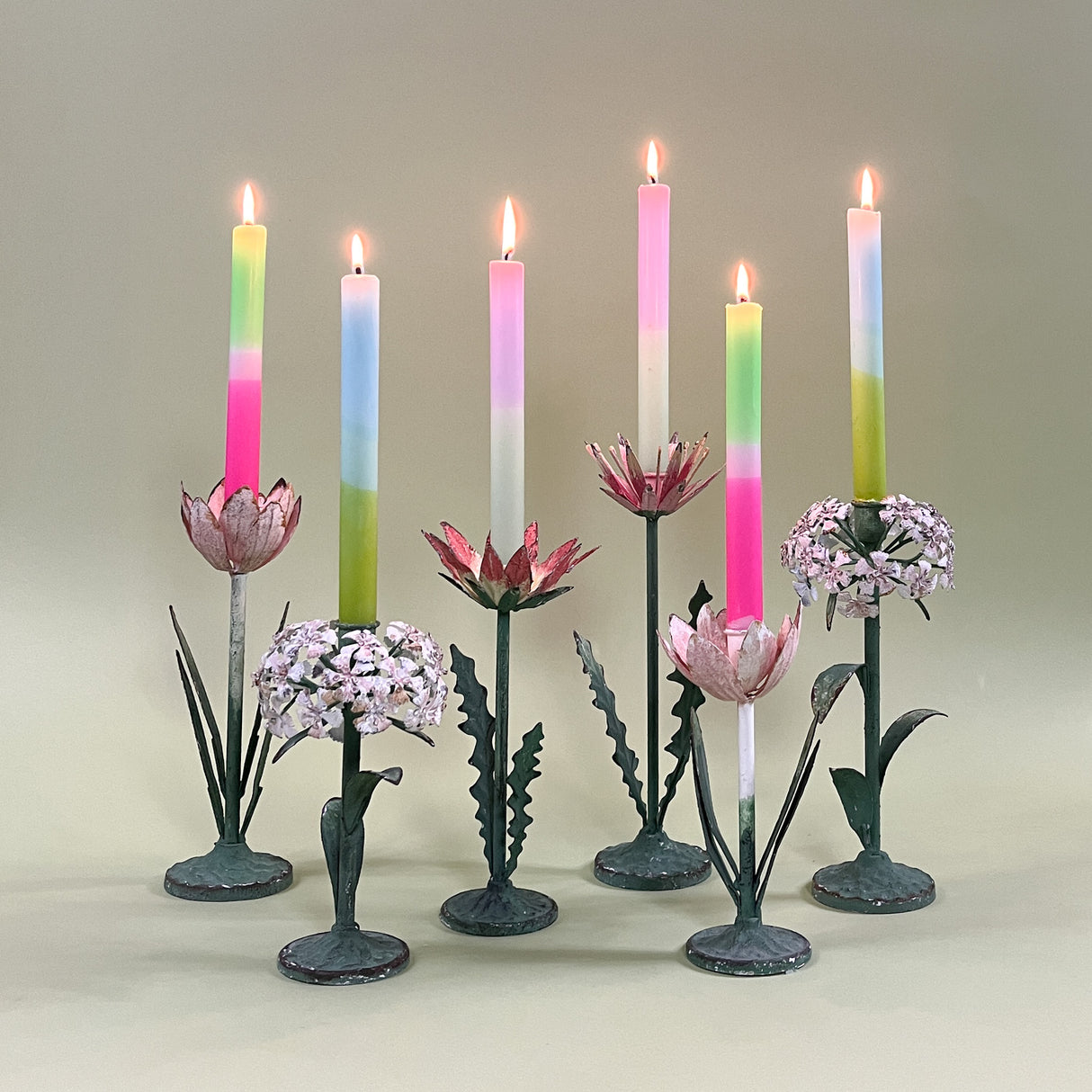 Hand-painted tole metal flower candle holders with candles