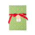 Elegant gift wrap featuring delicate white floral patterns on a vibrant green background for beautiful presents.