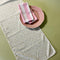 green and white Toujours Provence in celery green cloth table runner with plate and dinner napkin