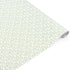 Elegant gift wrap featuring delicate green floral patterns on white paper, perfect for thoughtful gifting.