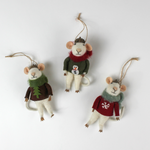 Three felt mouse ornaments wearing cozy sweaters with festive designs—a snowman, a tree, and a snowflake—each topped with a tiny acorn cap and ready to hang.
