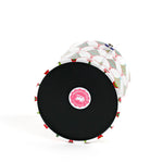 showing the bottom of a Twinkle Trees acrylic ice bucket covered in a green Christmas tree pattern.