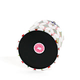 showing the bottom of a Twinkle Trees acrylic ice bucket covered in a green Christmas tree pattern.