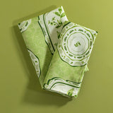a pair of green vintage plates fabric napkins