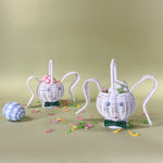 white rattan bunny easter baskets with eggs