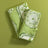 a pair of green vintage plates fabric napkins