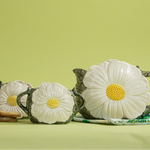 a set of three vintage daisy creamer set