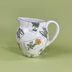 a vintage tiffany & Co pitcher in the strasbourg flowers pattern. 