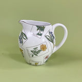 a vintage tiffany & Co pitcher in the strasbourg flowers pattern. 